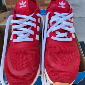Adidas Men’s Red and White Sneakers